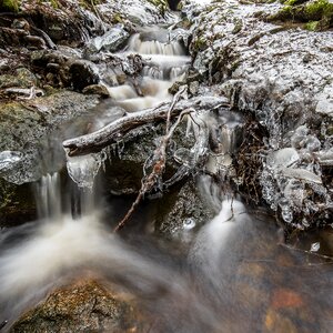 Frozen brook flow photo