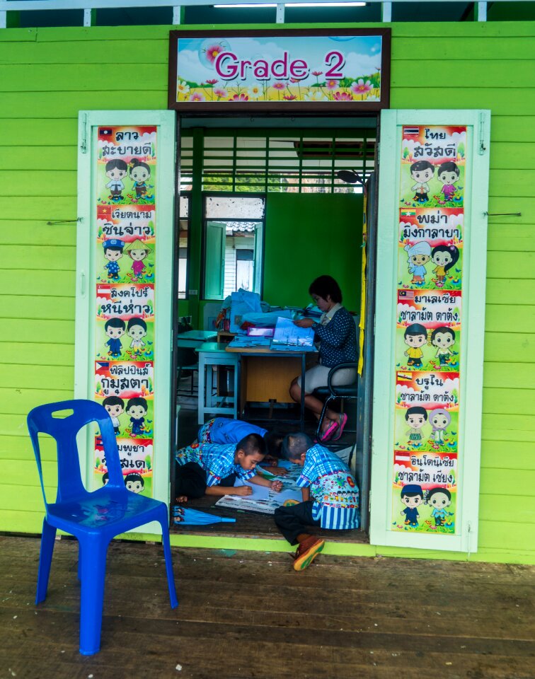 Floating fishing village classroom children students
