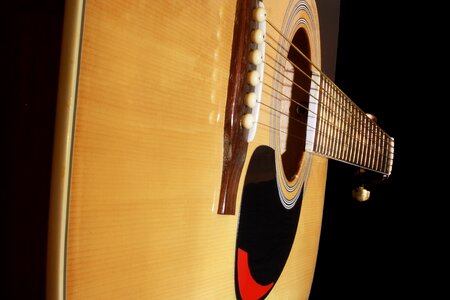 Musical instrument wooden guitar strings photo