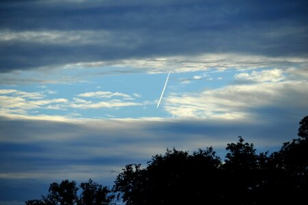 Sky heavy clouds trail