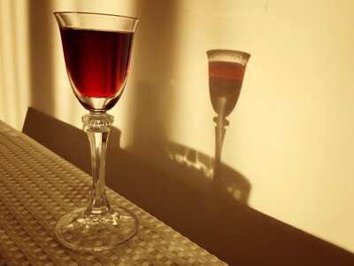 A glass of light and shadow wine photo
