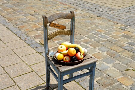 Summer health food on chair with paving stones