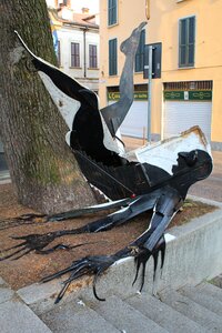 Modern art sculpture man falling