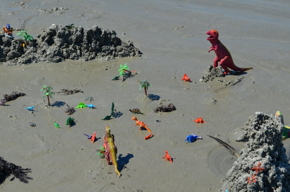 Toys water wet sand
