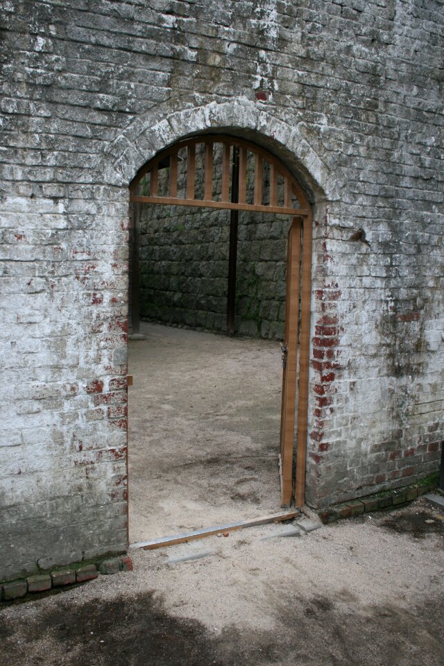 Stone entrance gray prison