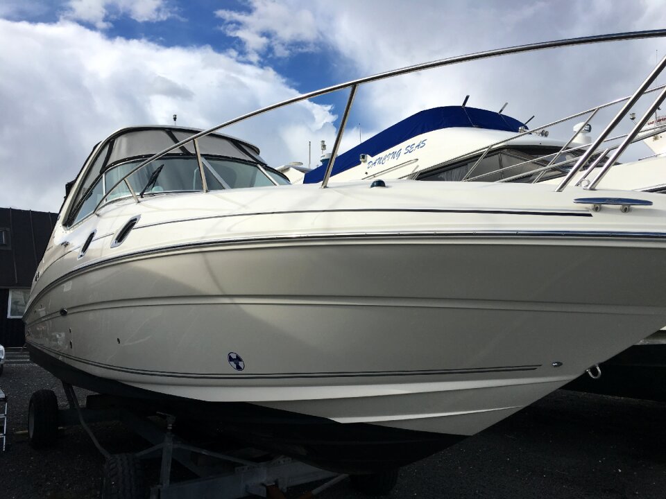 Pleasure boat on land sportscruser motorboat