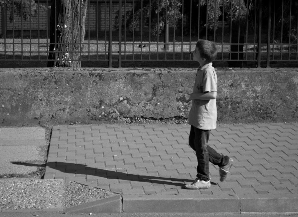 Child alone black and white