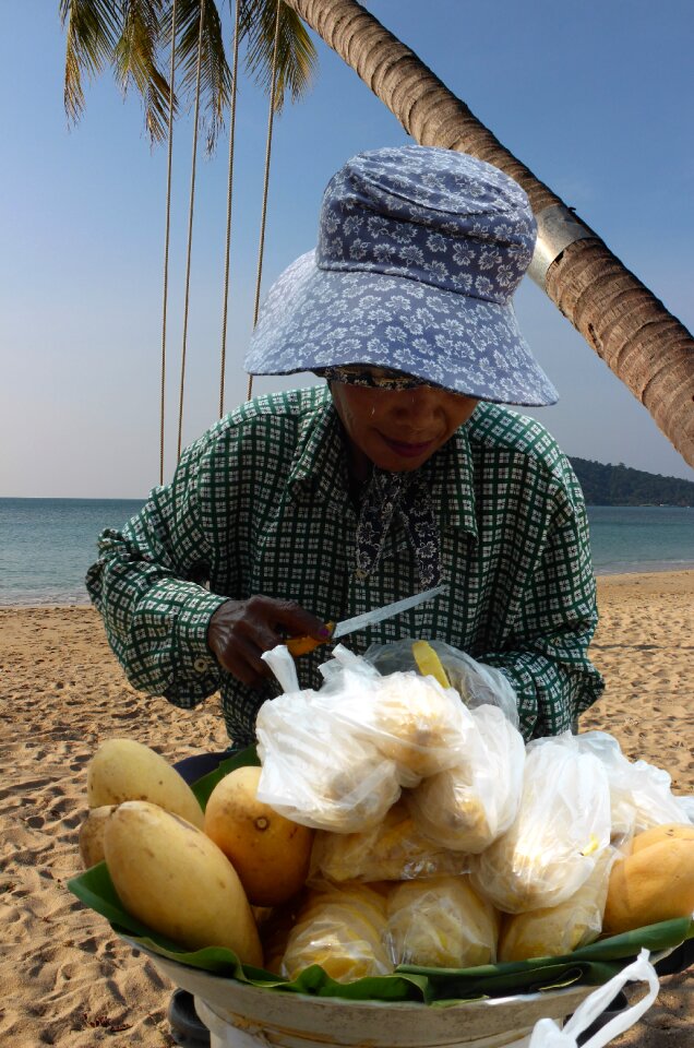 Shop assistant fruit saleswoman beach