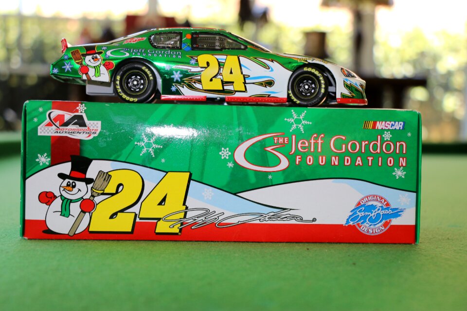 Toy cars play racing