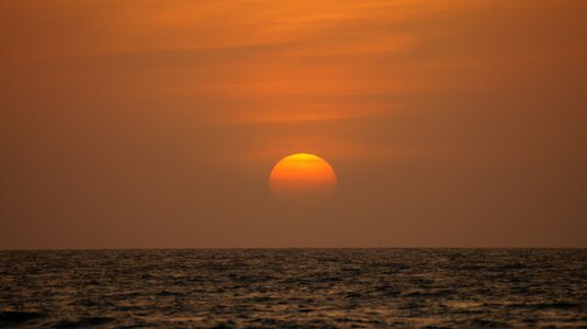 Beach sea red sun photo