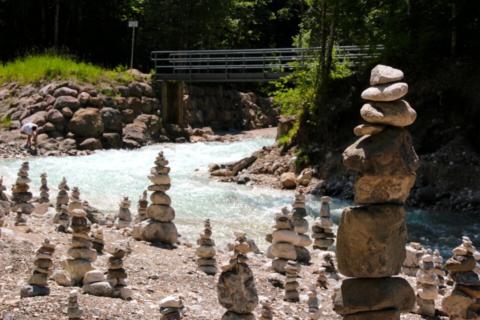 Stacked stones shaky water