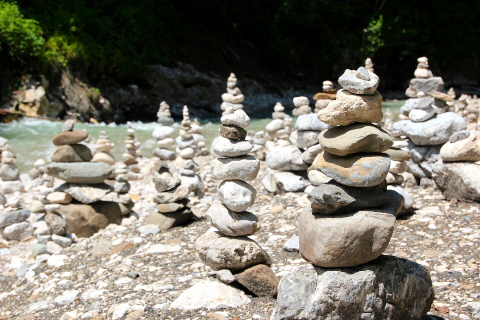 Stacked stones shaky water