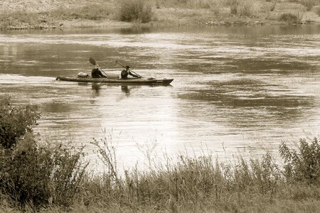 Canoeing paddle black and white photo