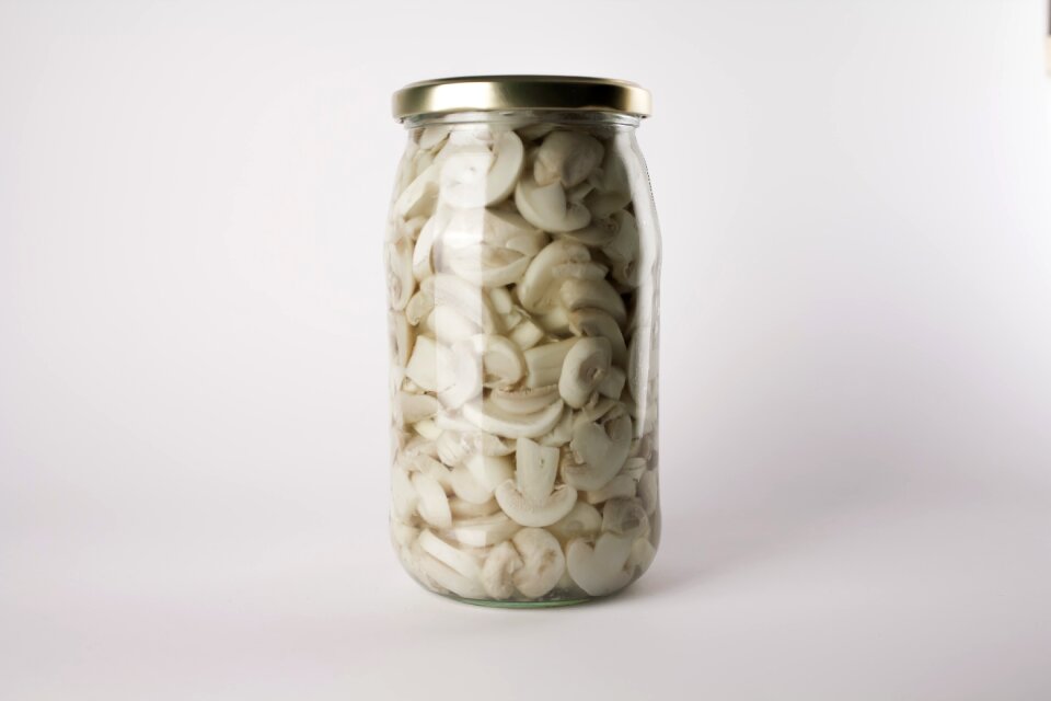 Mushrooms jar sliced