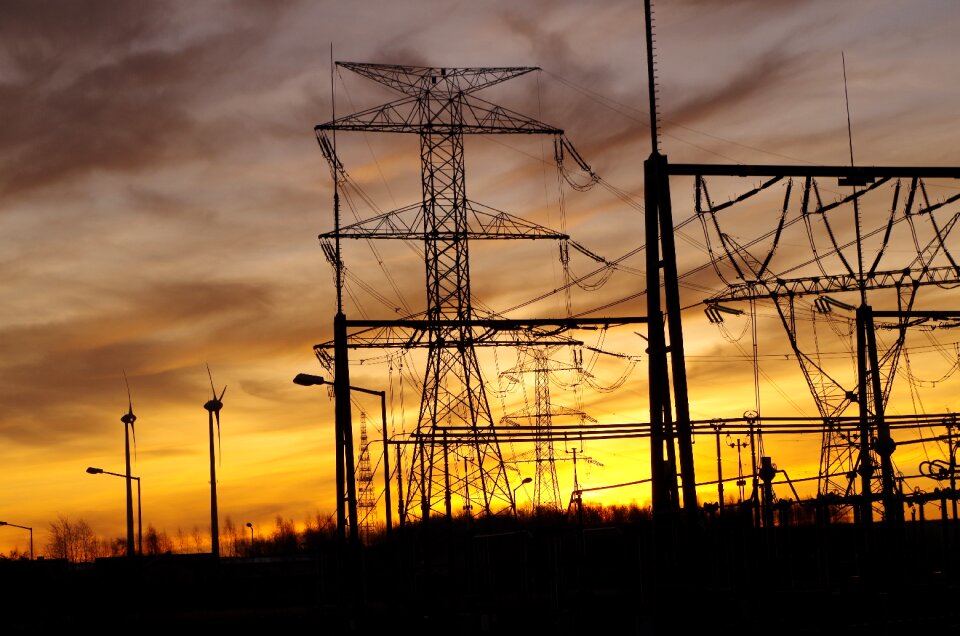 Poles high-voltage line sunrise