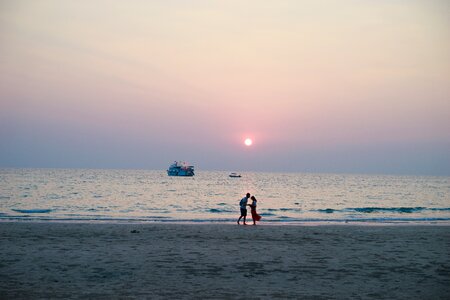 Sunset beach couples photo