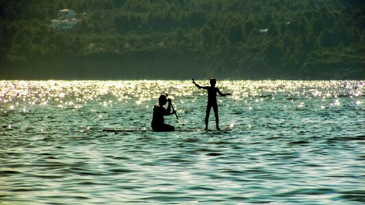 Sunlight shadows father and son photo