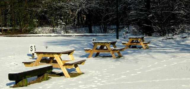Picnic tables winter snow