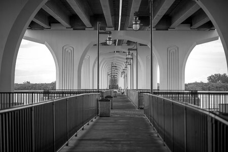 Pier river black and white photo