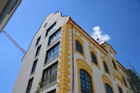 Tower house glass mirroring photo