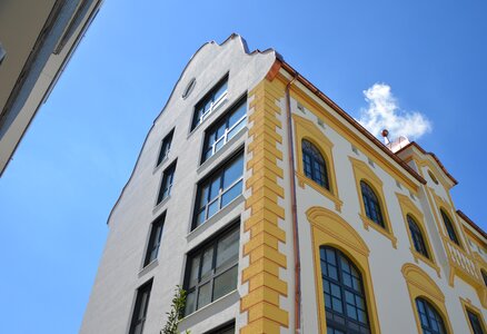 Tower house glass mirroring photo