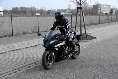 Motorcyclist motorcycling two wheeled vehicle photo