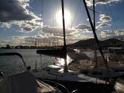 Alcudia harbor twilight sailing boats photo
