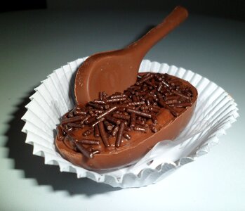 Egg harvesting chocolate easter egg