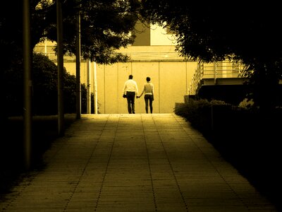 Park walk holding hands