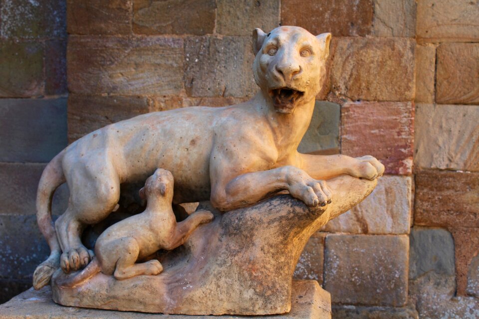Lioness lion cub sculpture