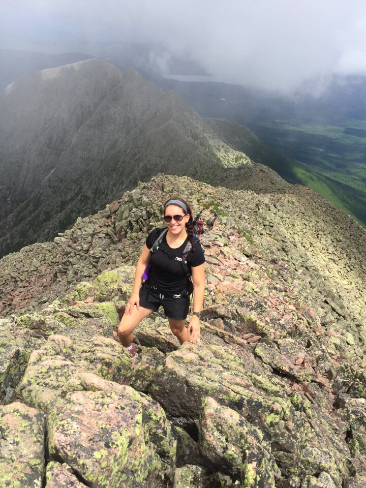 Woman top mountain