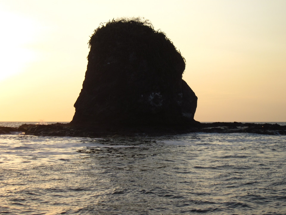 Rocky silhouette sea