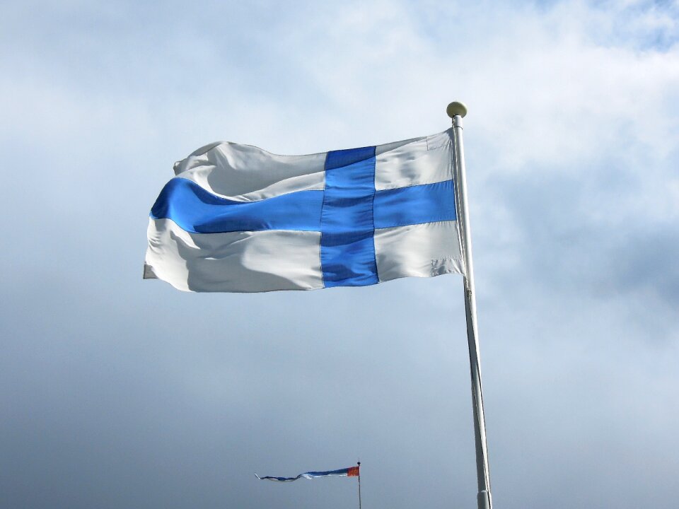 Finnish flag of finland fly as well as the