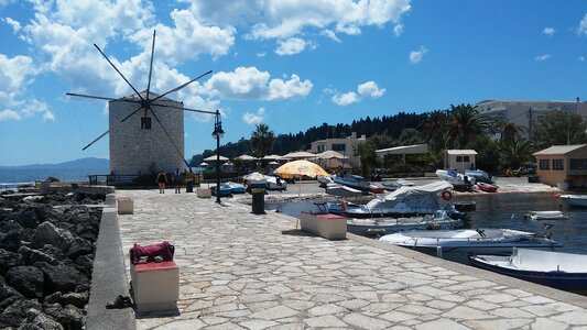 Greek mill corfu at the seaside photo