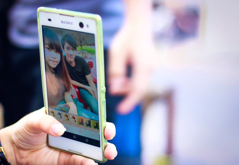 People smartphone smiling