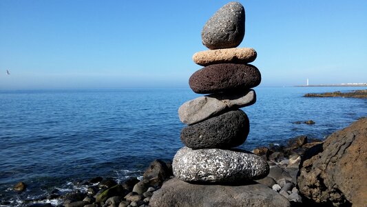 Stacking stones balance cairns photo