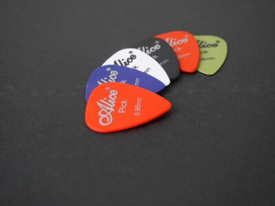 Guitar pick gray guitar