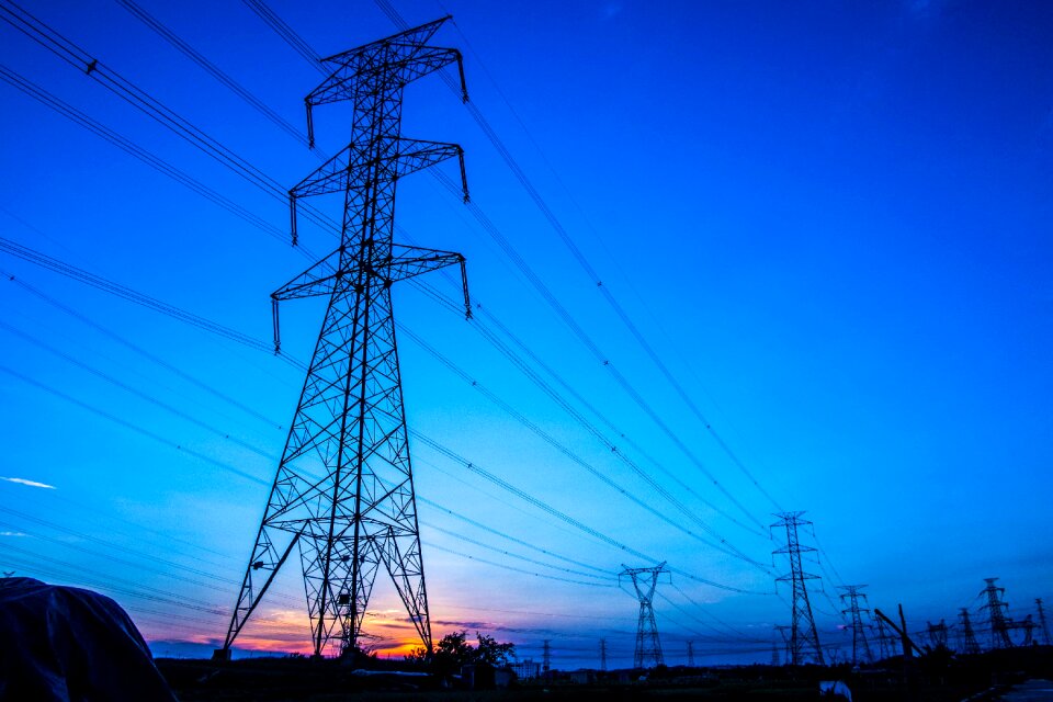 Pylons transmission line sunset