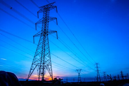 Pylons transmission line sunset photo