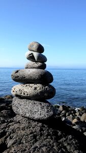 Stacking stones balance cairns photo