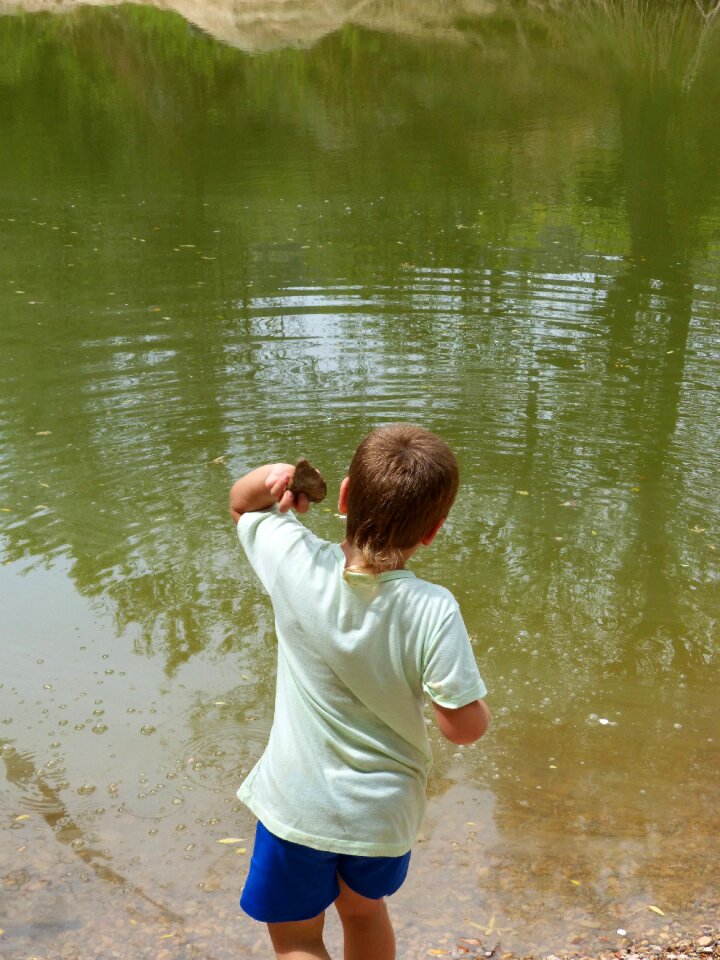 Stone throwing throw stones children play