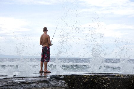 Man swimming trunks fish