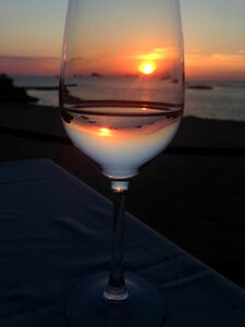 Wine glass sunset sea