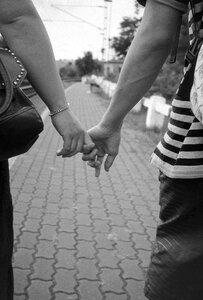 Love couple holding hands romantic photo