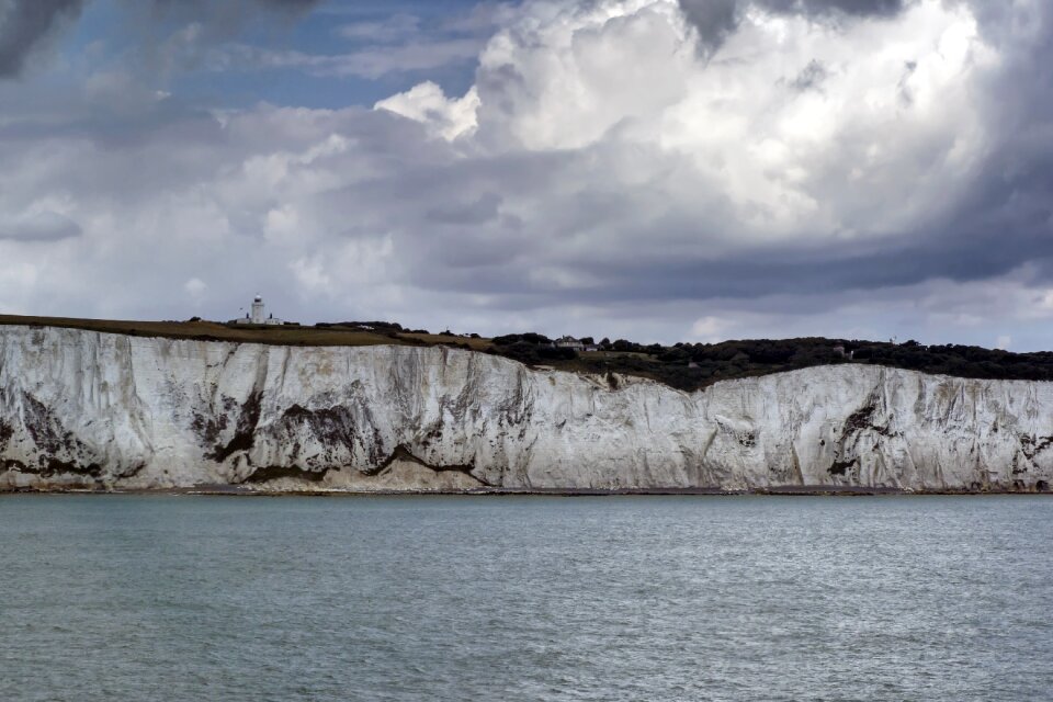 Rock clouds sea photo