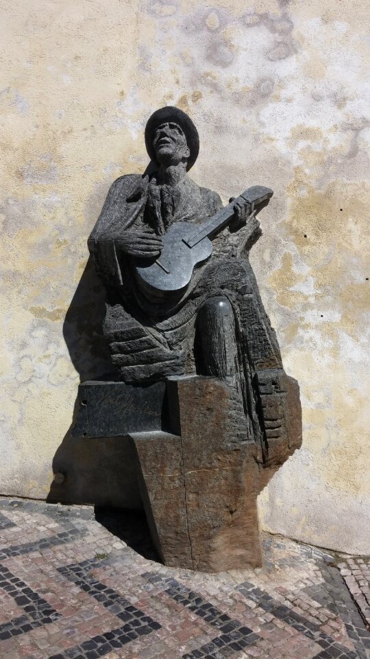 Statue brown guitar