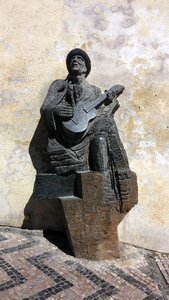 Statue brown guitar