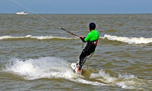 To hold on board glide over water photo