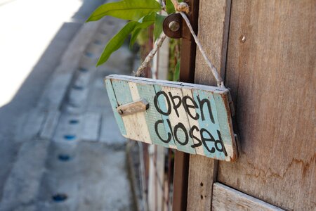 Open closed wooden sign photo