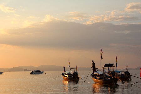 Afterglow silhouette boats photo